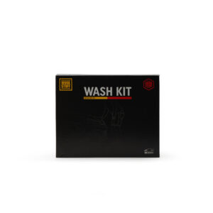 A black rectangular box labeled Work Stuff Wash Kit with gold and red accents, featuring a faint outline of a car and a person washing it on the front. The box is photographed against a white background.
