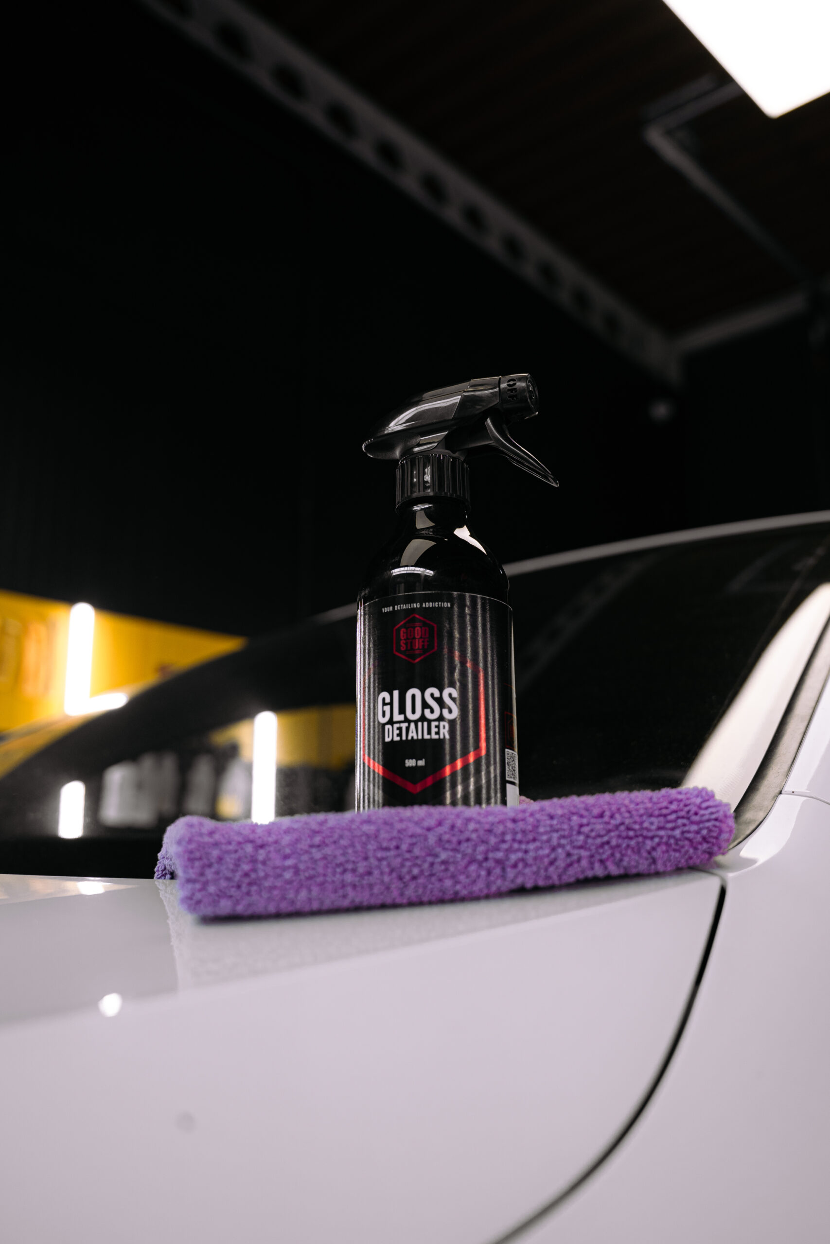 Good Stuff Gloss Detailer being applied to clean car paint