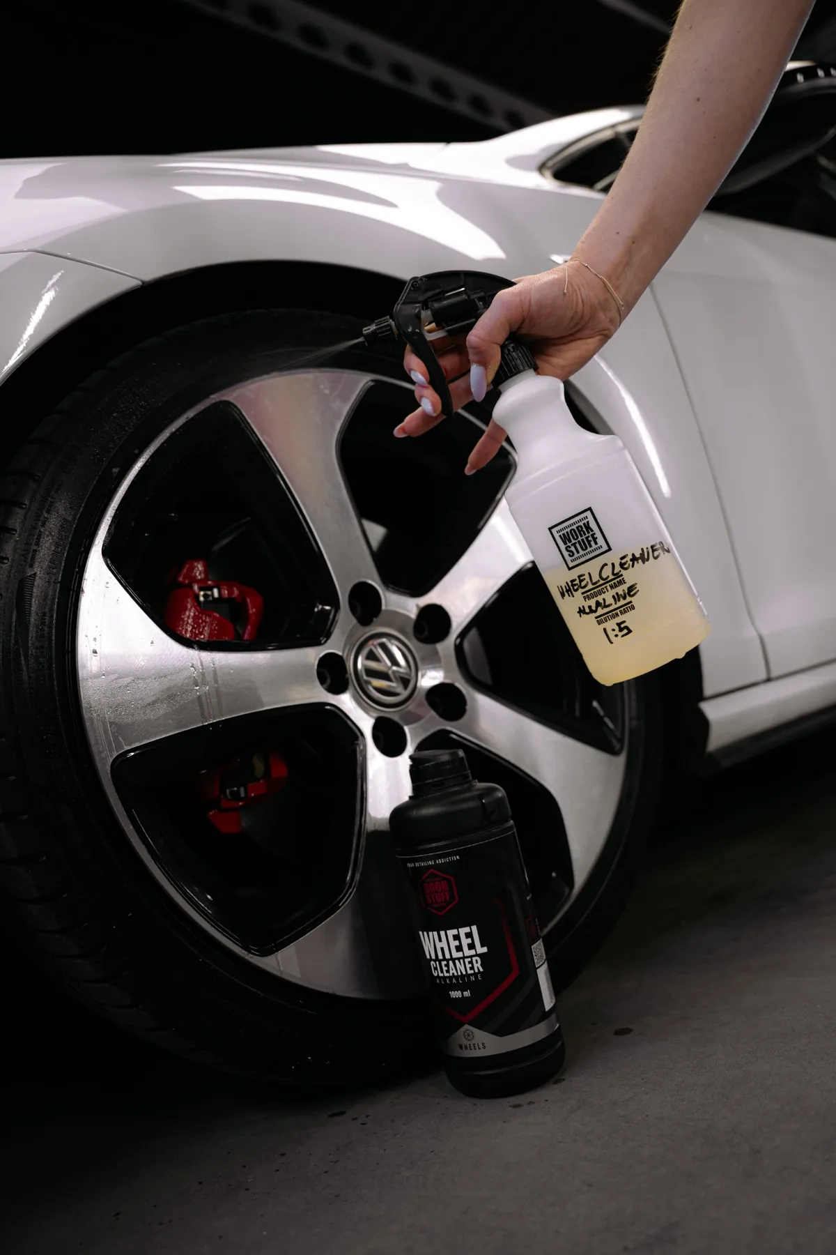 Good Stuff Wheel Cleaner Alkaline sprayed onto a wheel from a Work Bottle
